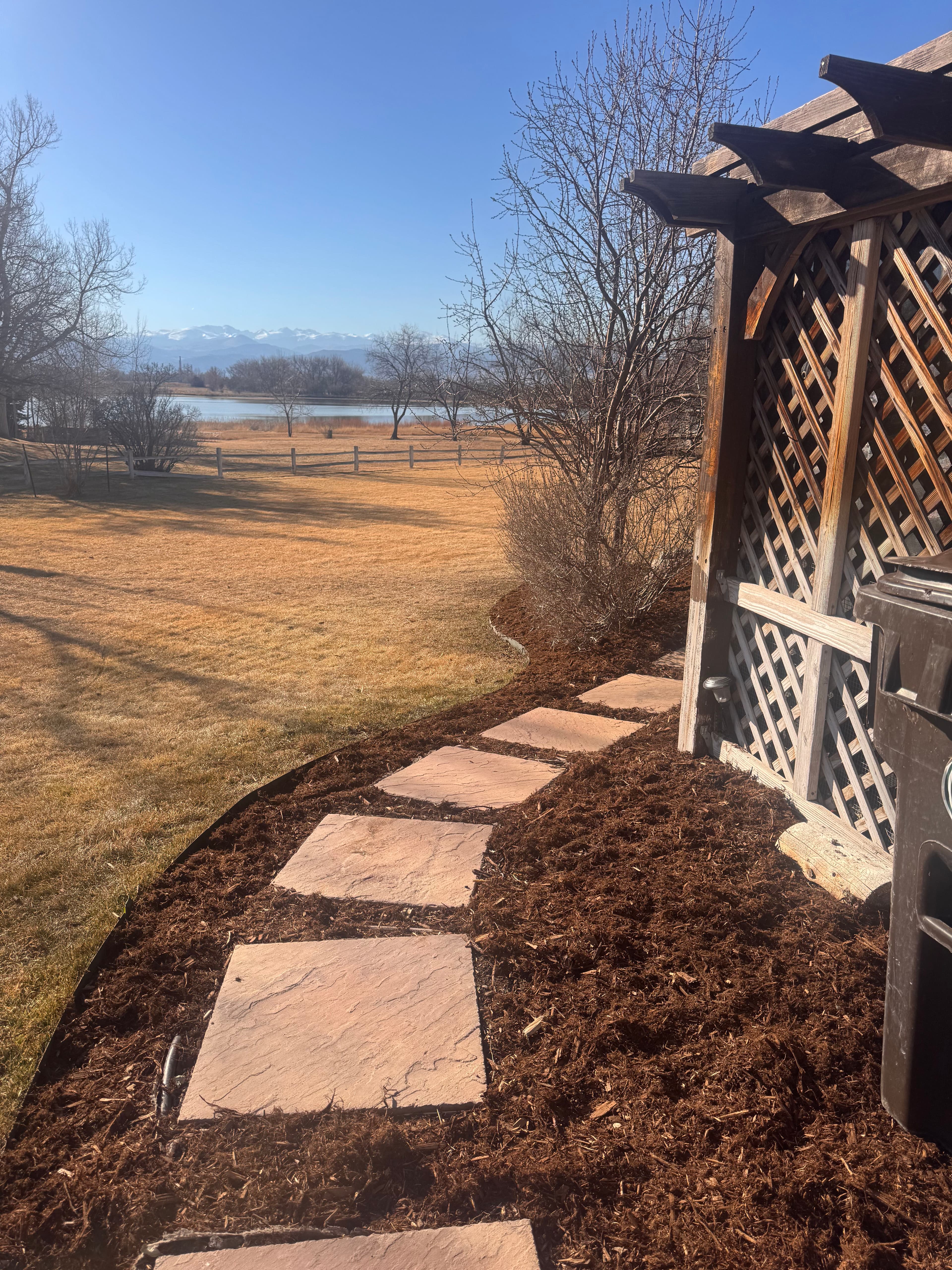 Project Elevating Outdoor Spaces with Steppers and Mulching image